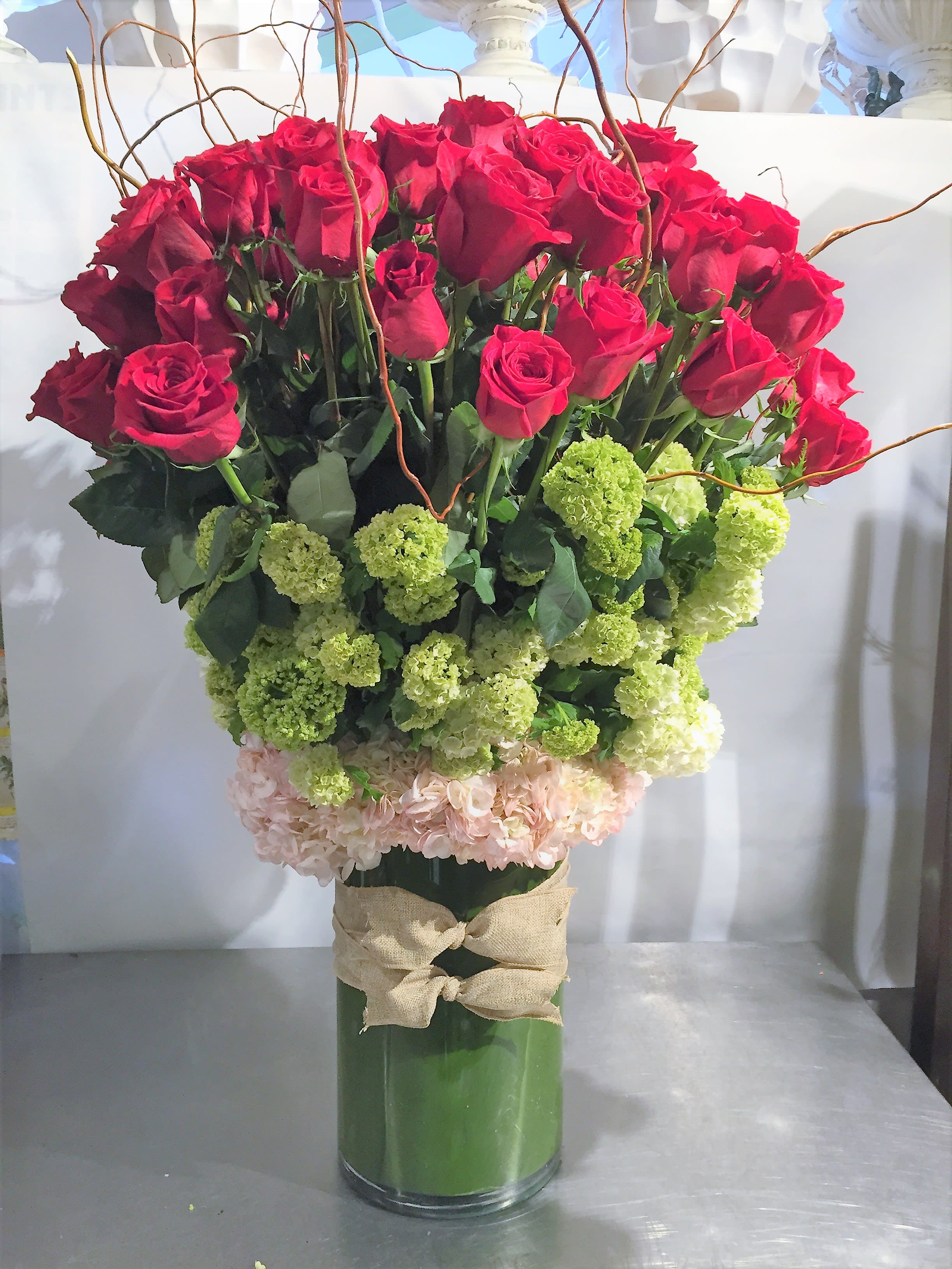 Rows of Roses - Impress with the best in this stunning all around rose arrangement.  Grand and breathtaking.  
