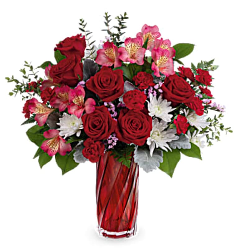 Swirling Splendor - Celebrate the splendor of true love with this radiant red rose bouquet, presented to perfection in a shimmering art glass vase with stunning swirling shape.
