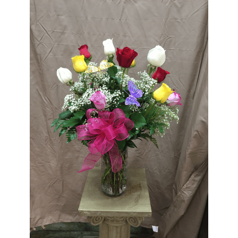  Dozen Multicolored Roses by Park Florist  - Our exquisite bouquet of magnificent, long-stem assorted colored roses, complements any occasion with unforgettable style. Because only the freshest roses are selected for this arrangement, actual rose colors will vary due to availability.  12-stem arrangement measures approximately 22&quot;H x 15&quot;L    SKU#: PFDozenMulticoloredRoses 