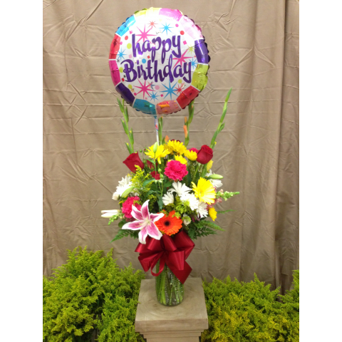  Birthday Wish  -  Celebrate your recipient's big day with a bouquet of bright spring flowers. Includes a Birthday balloon.    SKU#: PF BirthdayWish 