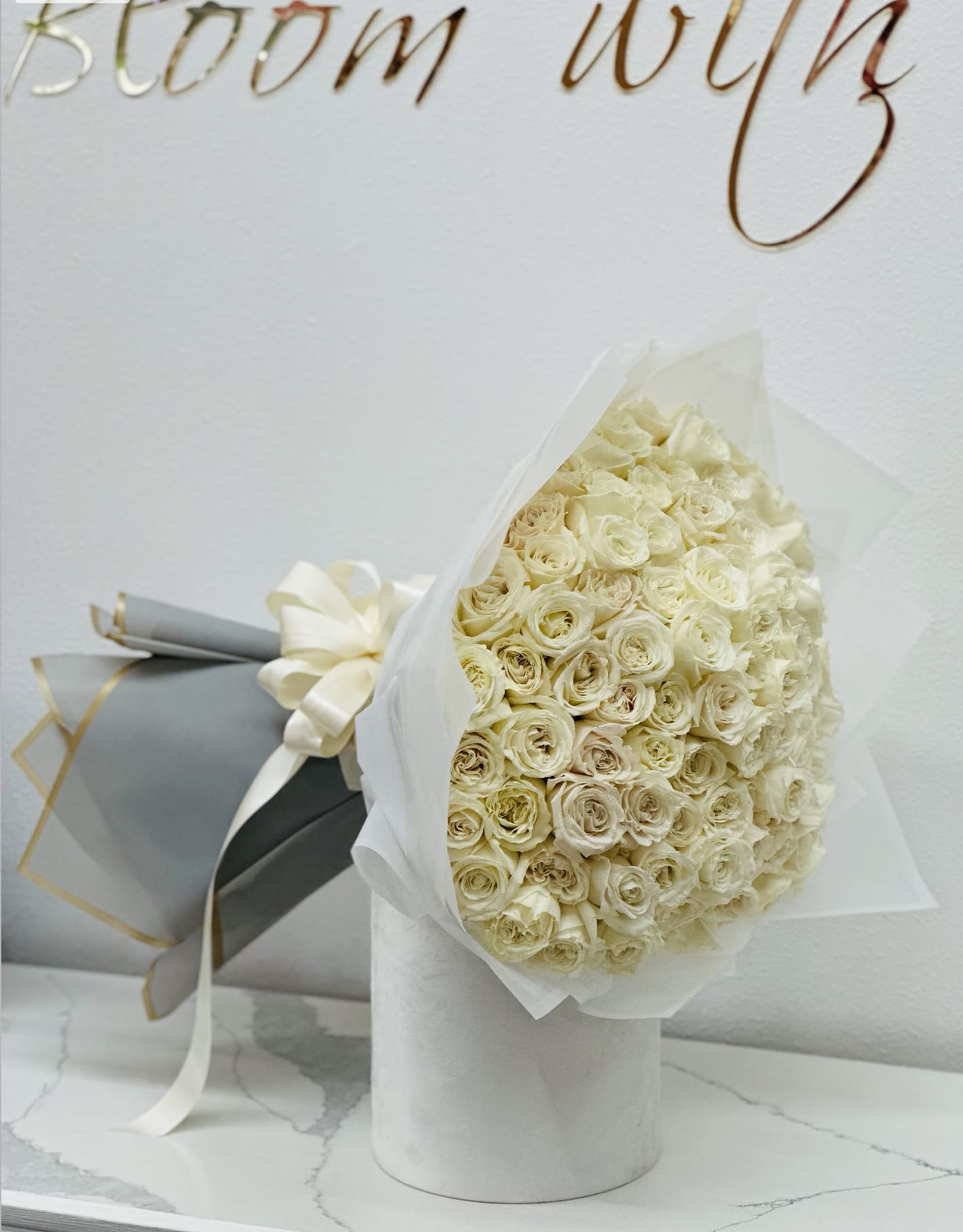 Danala - An elegant all white bouquet. 