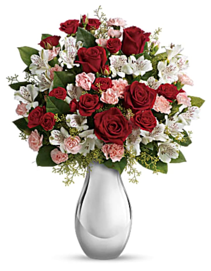 Crazy for You - This wildly romantic bouquet is called &quot;Crazy for You&quot; because that's what she'll be when she sees it. Luscious red roses, white alstroemeria and pink carnations in a dazzling silver reflections vase - beautifully breathtaking.