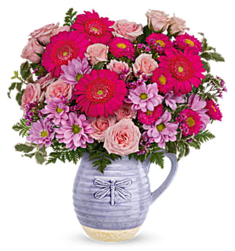 Pour On The Lavender - Lovely in lavender! With its beautiful artisanal glaze and whimsical dragonfly, this sweet ceramic pitcher--that's also food-safe!--makes the perfect presentation for a bright pink Mother's Day bouquet.