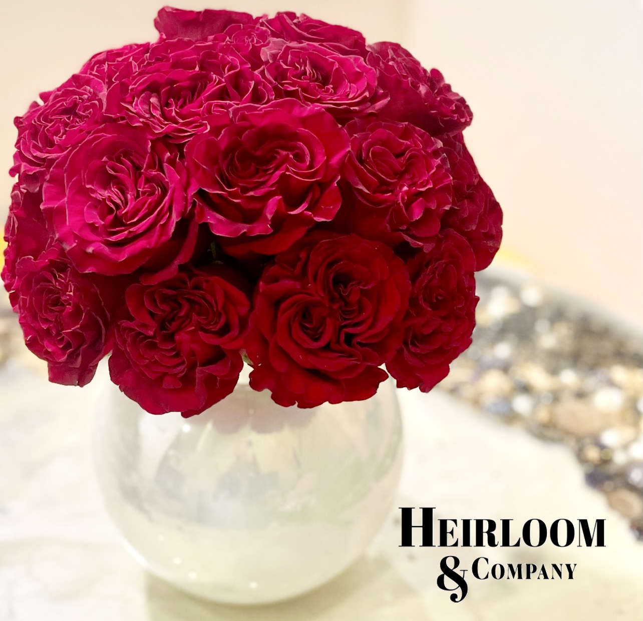 Love Letter Flower Arrangment - Ingredients: Red garden roses in an iridescent bubble vase. 
