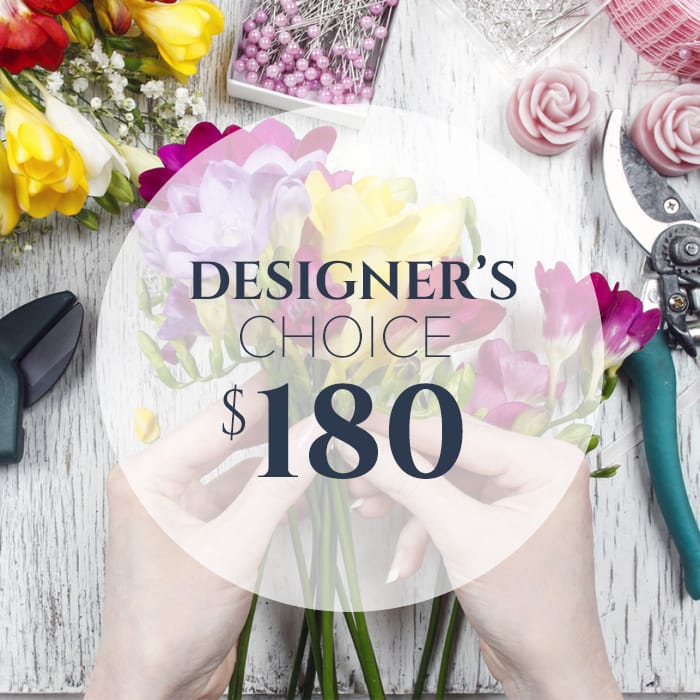 Designer's Choice $180 Designer's Choice $180 - Let our designer create a beautiful arrangement with the freshest flowers of the season!