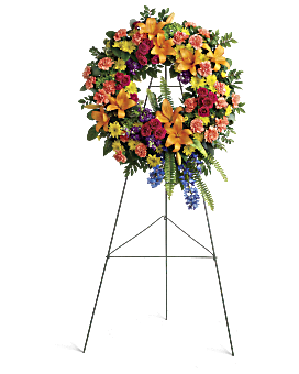 Colorful Serenity Wreath Colorful Serenity Wreath - Like a beacon of love and hope, this glorious wreath of hydrangea, roses and lilies echoes the joy of your precious memories.