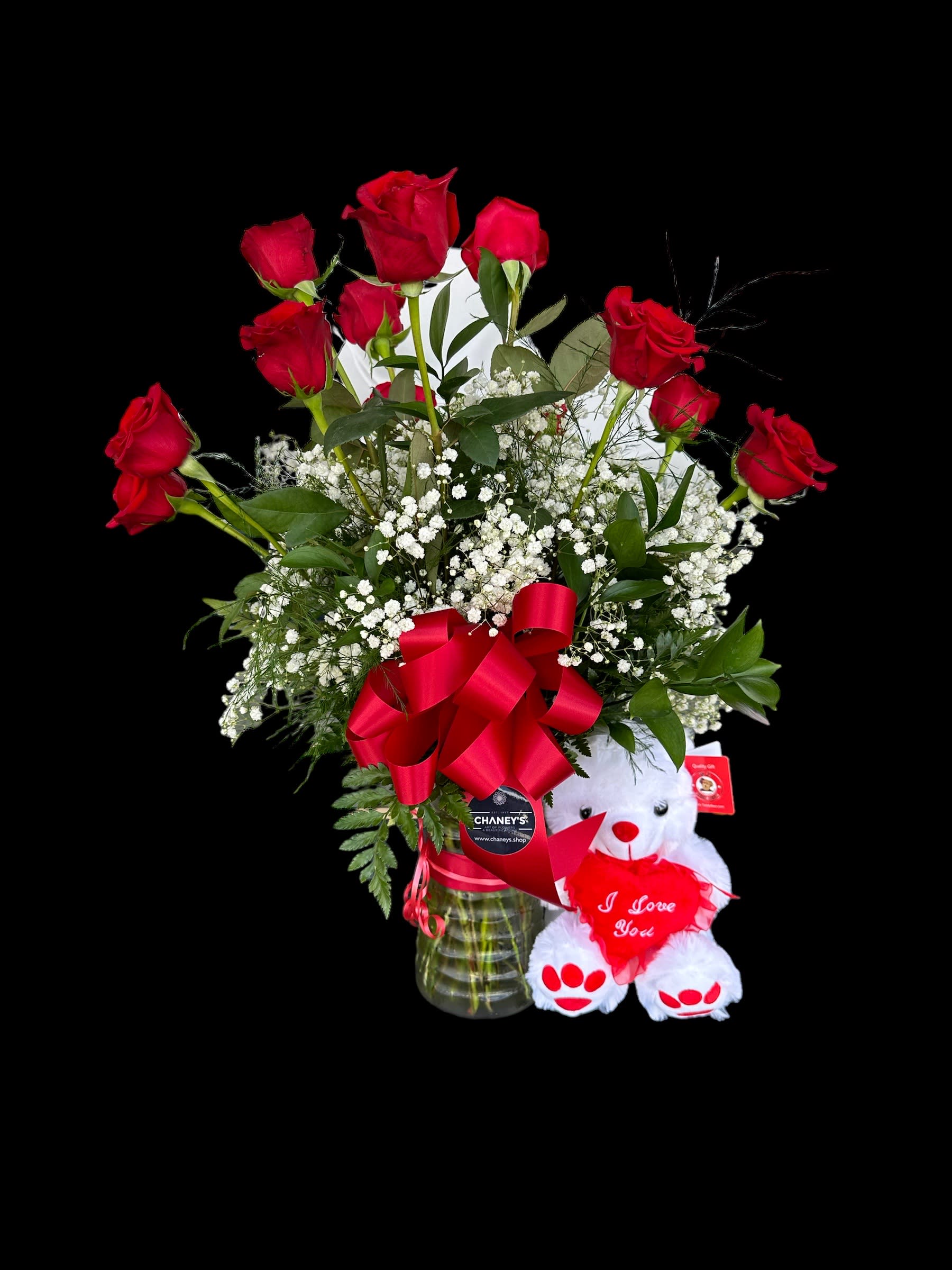 Chaney´s Red Romance 1008 - a dozen beautiful red roses arranged with a little green and a cute teddy bear attached. Hi great way to send a floral message!