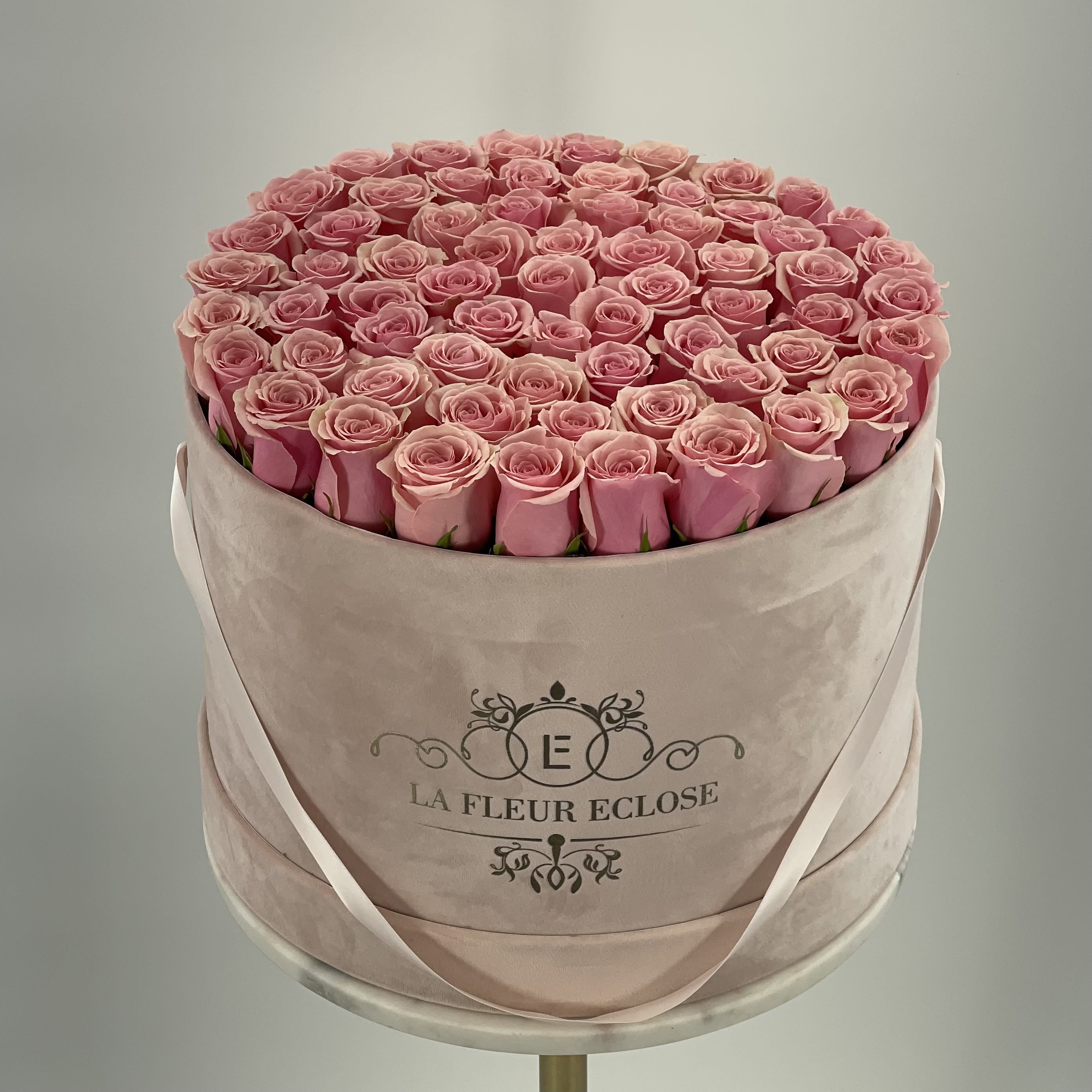 For Mom V - 70 light pink roses in our velvet signature box 