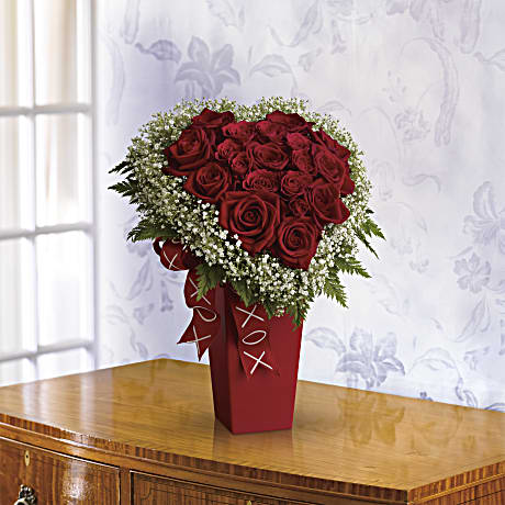 Heart and Soul Bouquet Heart and Soul Bouquet - Send someone this soulful floral gift and there'll be no mistaking that you're giving them your heart! A heart made entirely of red roses is nestled in a cloud of white spray roses, sinuata statice and greenery and presented in a tall red vase adorned with a pretty ribbon.