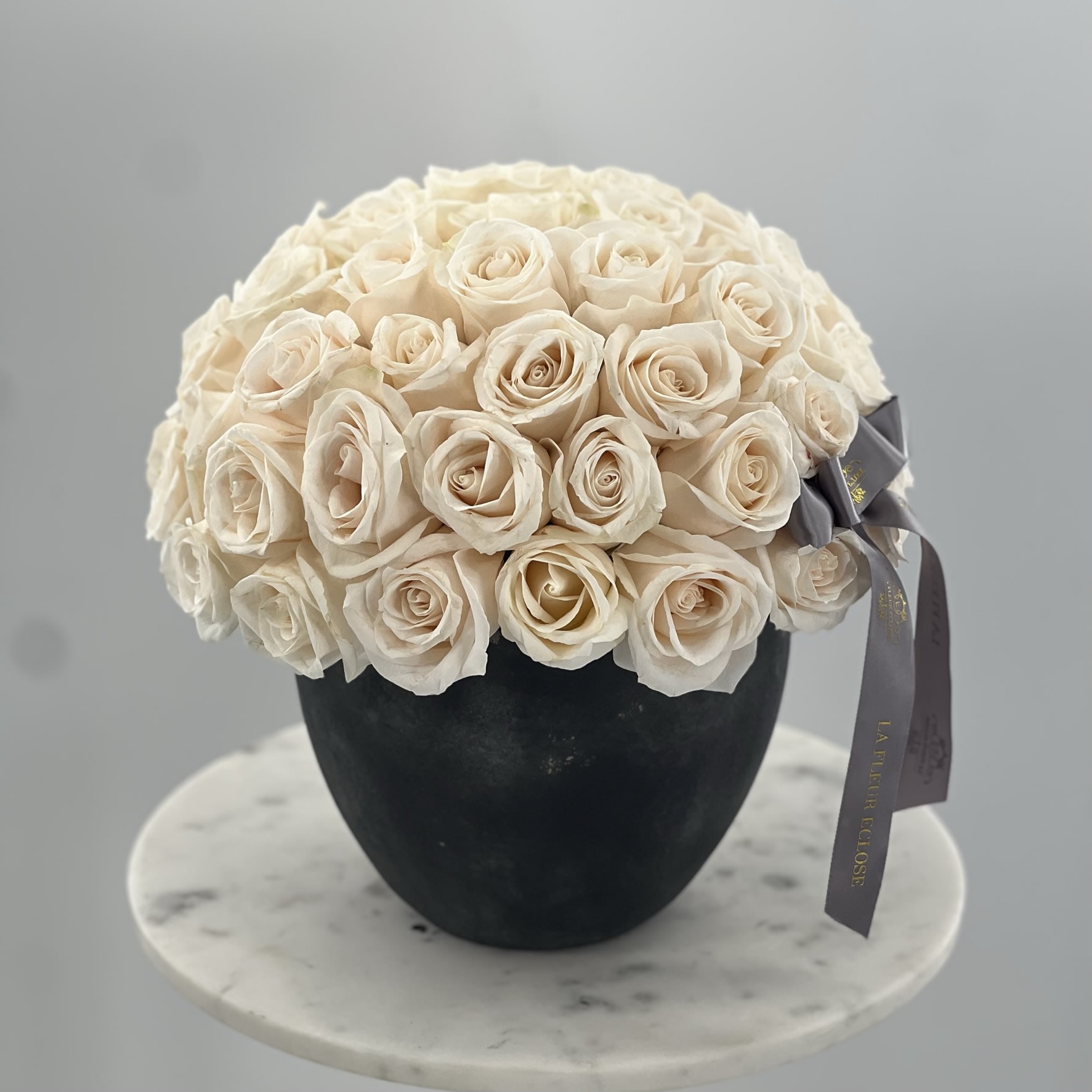 Classic White V - Stone vase with up to 52 white fresh roses