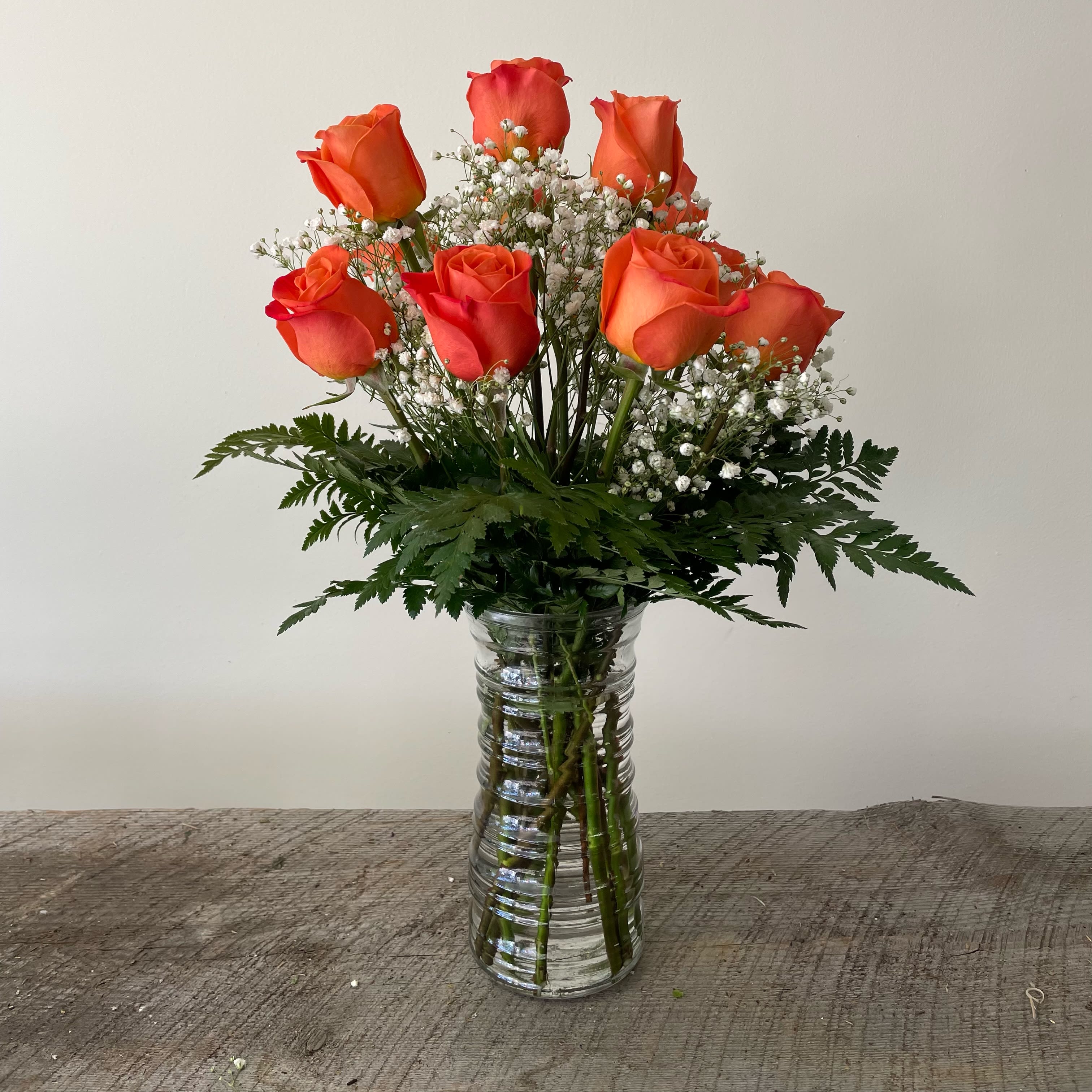 Dozen Orange Roses - Orange roses represent enthusiasm, creativity, and fascination. Deluxe: 16 roses Premium: 20 roses