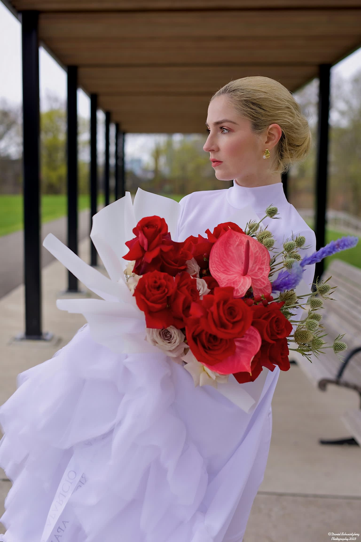 Designer Bouquet &quot;Paris Mon Amour&quot; - Our &quot;Paris Mon Amour&quot; designer bouquet is a sophisticated and elegant floral arrangement that captures the romance and allure of the city of love. The bouquet features the bold and beautiful Red Freedom and Meta Roses, accented with the delicate and charming Flamingo Flower and Hypericum Flower. Expertly arranged by our skilled florists, this bouquet is a breathtaking display of vibrant colors and textures that evokes the passion and intensity of Paris. This designer bouquet is the perfect gift to celebrate any special occasion or to simply brighten up a loved one's day. It's the epitome of luxury and style, crafted with the utmost care and attention to detail. Whether you're sending it as a gift or treating yourself, our &quot;Paris Mon Amour&quot; designer bouquet is sure to impress and delight. Let the beauty and elegance of this bouquet transport you to the romantic streets of Paris and make your heart skip a beat.  Medium - 25 stems (shown in pictures) Large - 50 stems Extra Large - 75 stems
