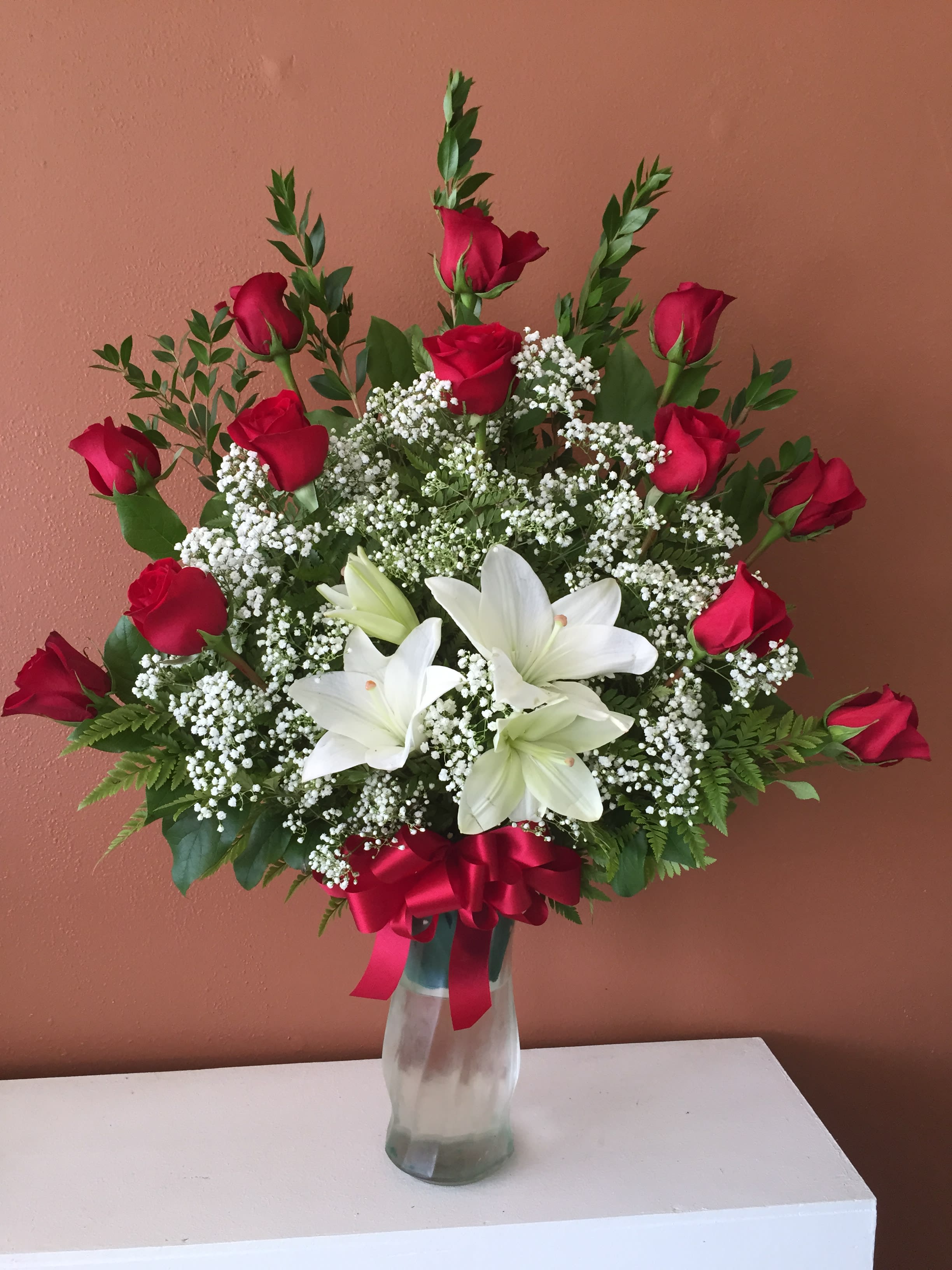 AA95 - Arrangement SUBSTITUTION POLICY – Always deliver the freshest flowers! Please note the bouquet pictured reflects our original design.  If the exact flowers or container in this arrangement are not available, our local florists will create a beautiful bouquet with the freshest available flowers.