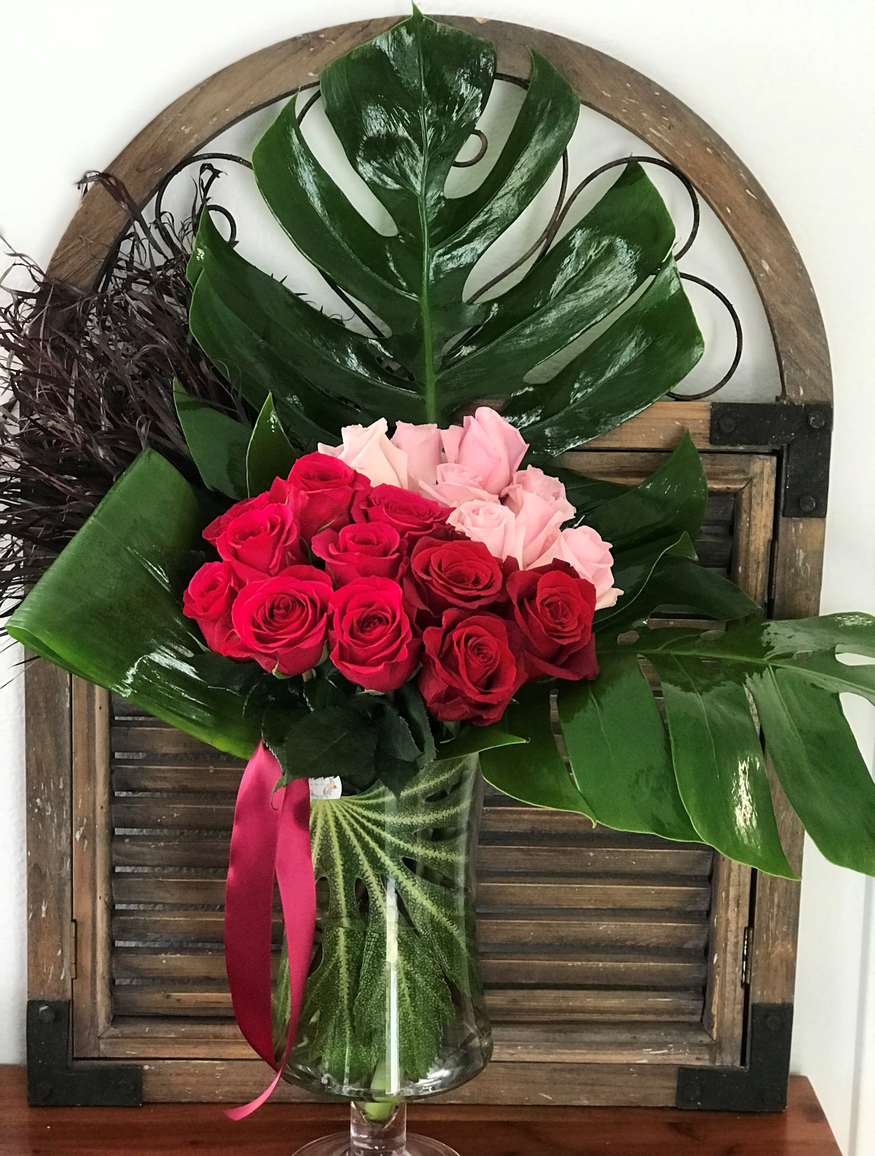 Tricolor Roses  - Take her breath away with this incredible display of 24 long stemmed roses, and Tropical leaves, beautifully arranged in a large crystal vase. Suitable for any occasion. Perfect to say 'I love you'  Same day delivery. All flowers are sent with a complimentary gift card containing your own personal message.  