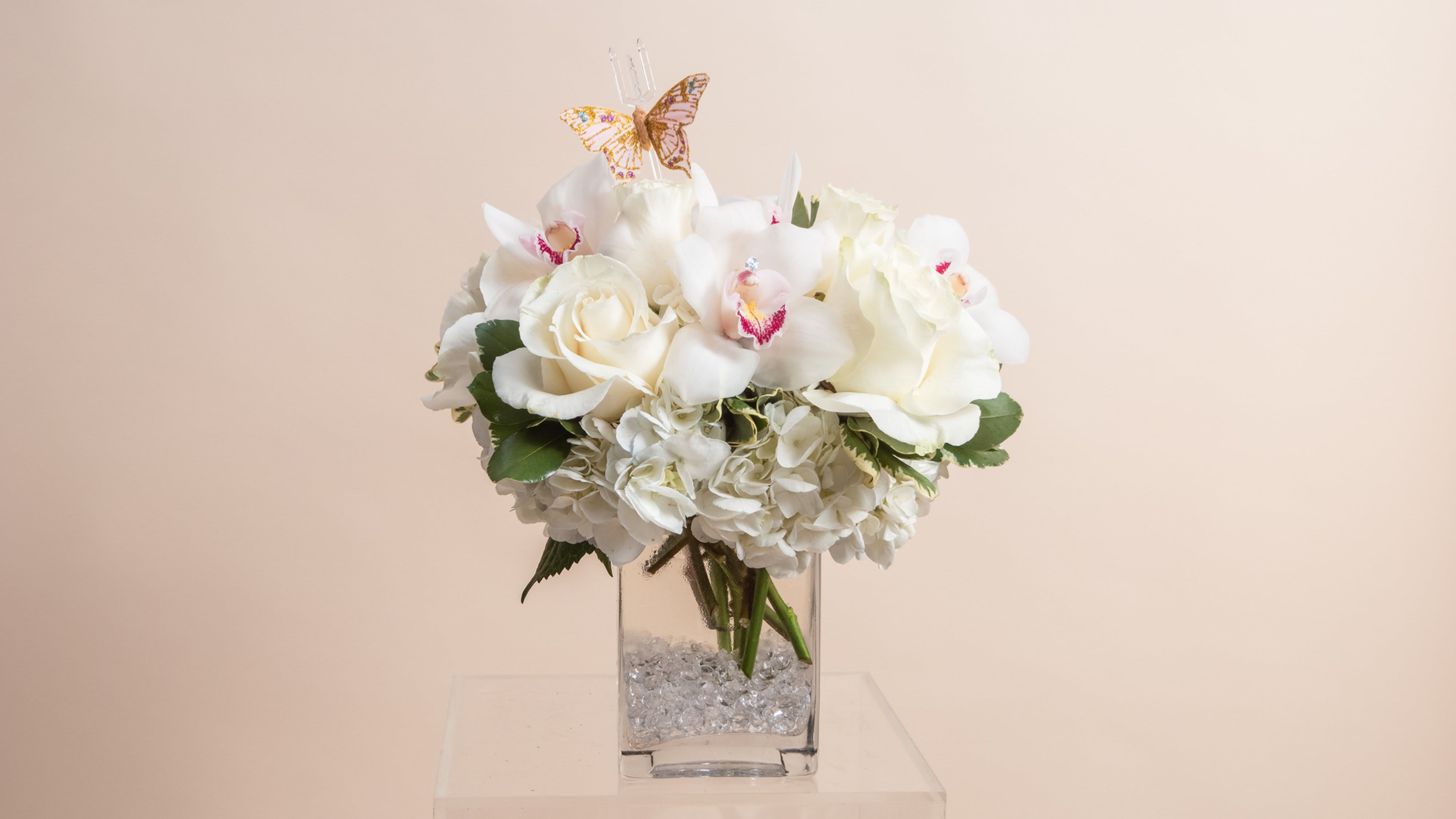 Darla - White ( Pink Orchids, Roses And Hydrangeas ) - One of our most popular designs, now available with white tones! This cute white bundle is perfect for so many occasions!  Roses, cymbidium Orchids, Lisianthus and hydrangeas