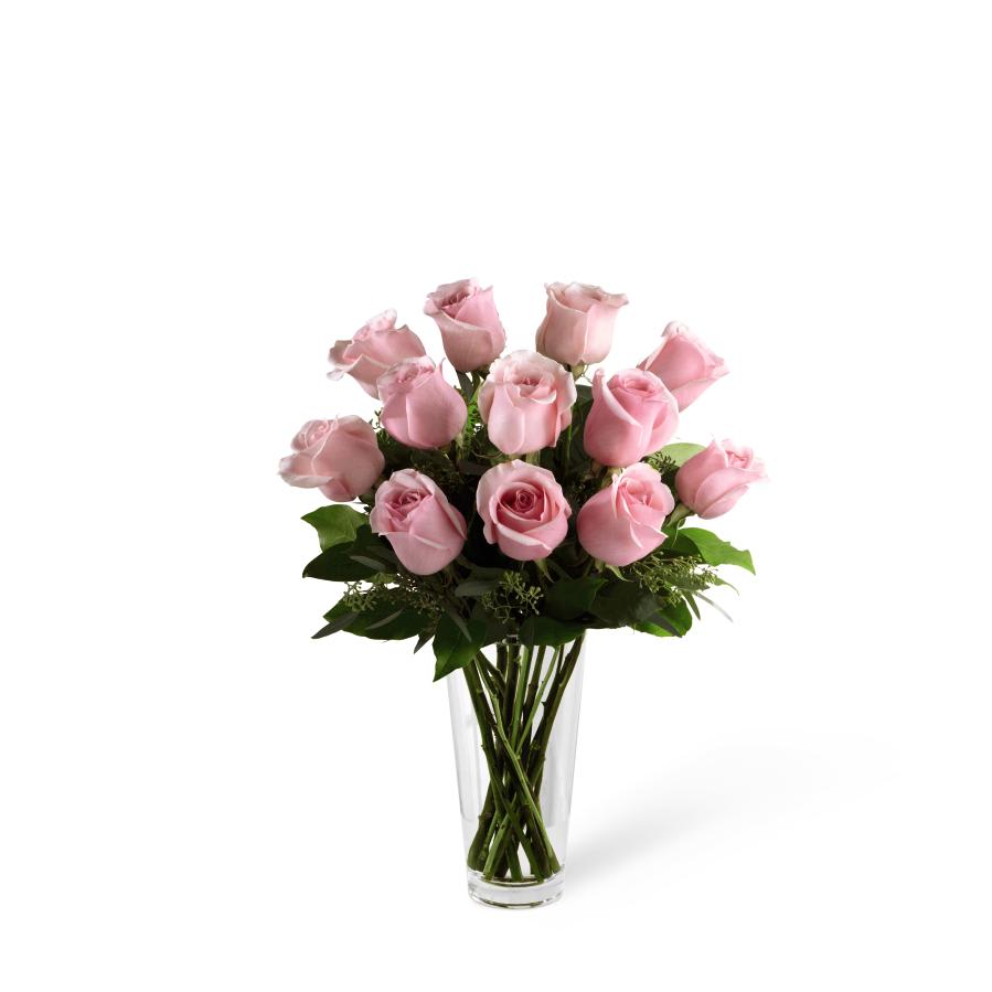 FTD Pink Rose Bouquet - Picture-perfect soft pink roses make a beautiful gift for the lovely  lady in your life. Wife, mother, daughter or sweetheart, she's sure to  cherish this bouquet of pastel pink roses accented with seeded  eucalyptus and arranged in a clear glass vase.    18h x 12w