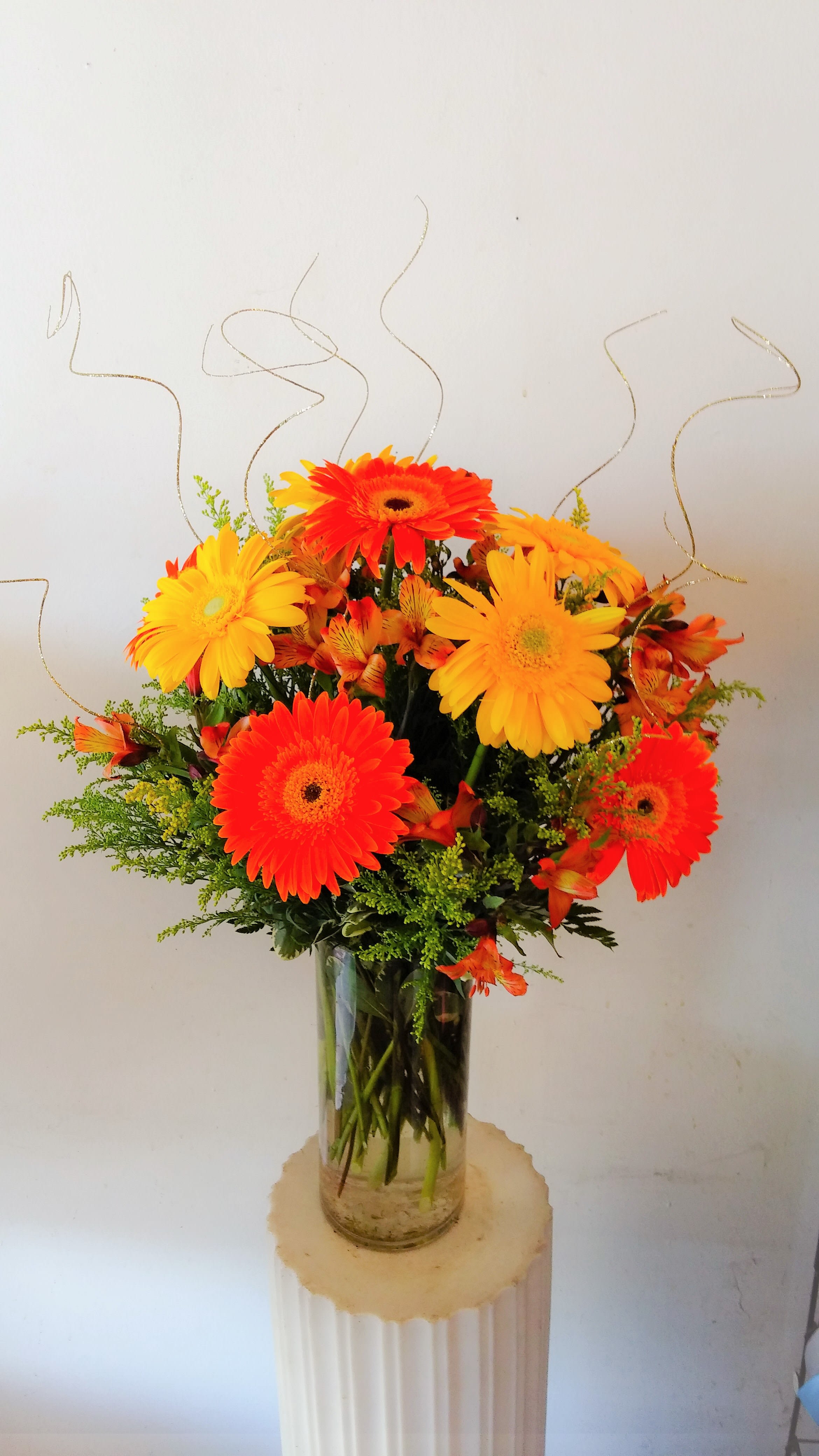 Sunshine - Cheerful arrangement of gerbera daisies.