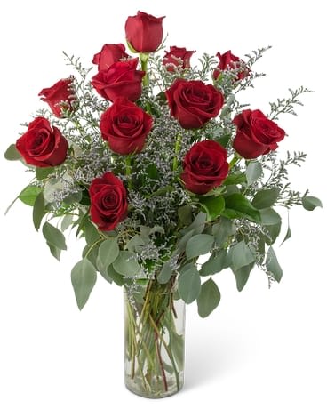 Elegance and Grace Dozen Roses - When you want to impress you always send the best. One dozen of our finest long stem red roses and premium greenery fill this larger than life bouquet. This floral gift simply expresses Elegance and Grace. 