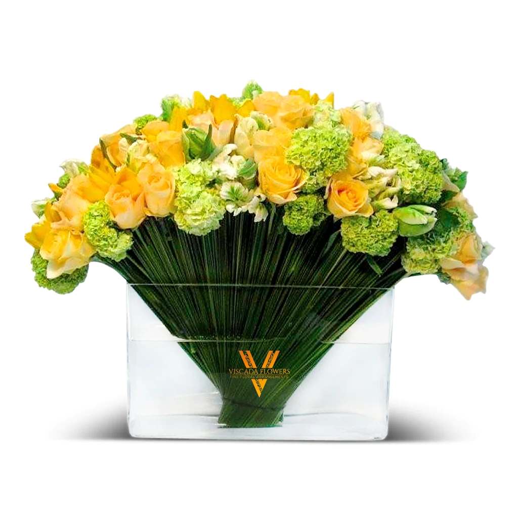 Sun Kissed - This vibrant bouquet showcases a delightful combination of yellows and greens, featuring sunny blooms and lush foliage. Perfect for adding a touch of radiant charm and natural beauty to any space.