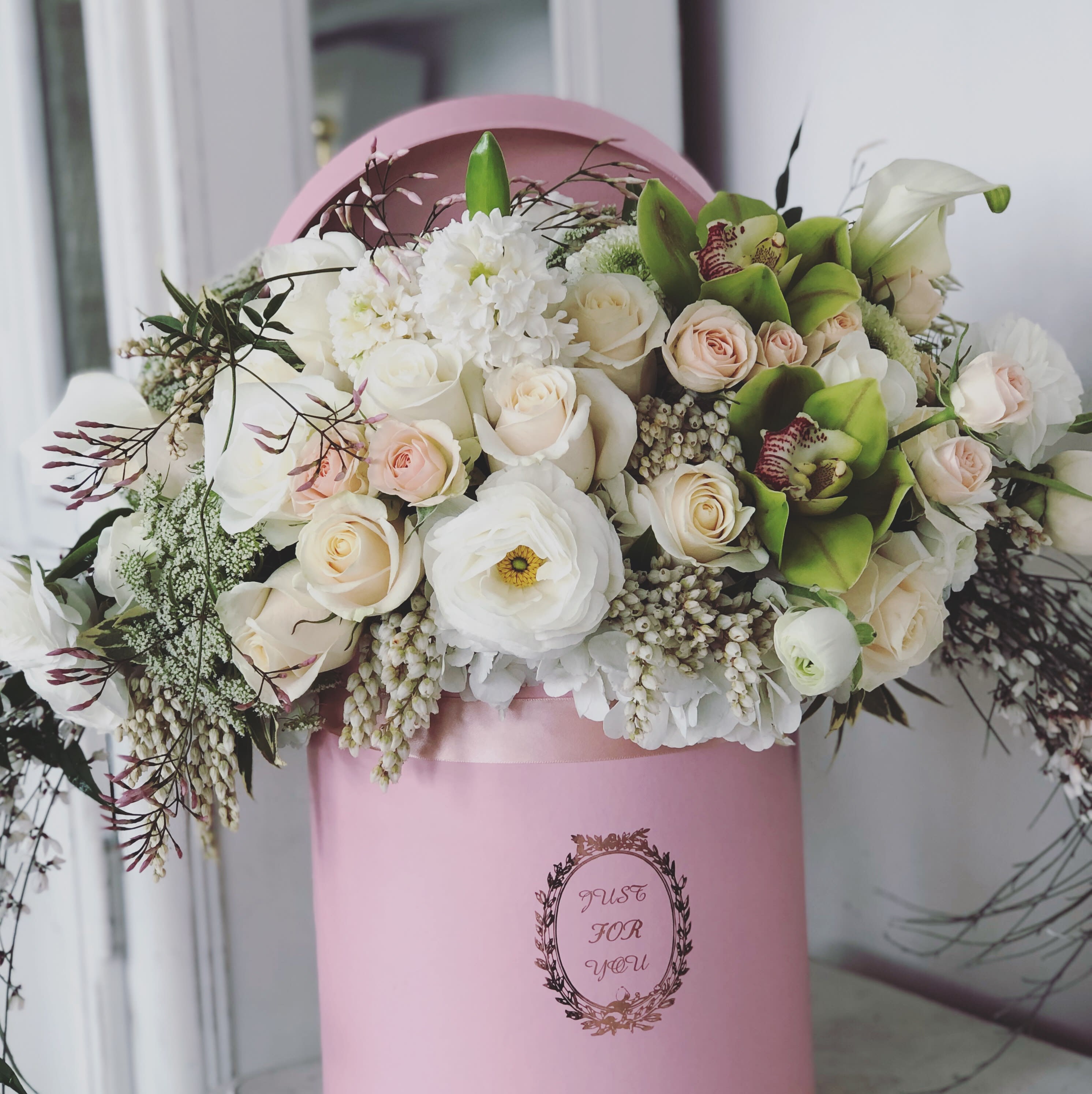 Glendale - Gorgeous box filled with beautiful seasonal white and green, pink romantic flowers. Boxed arrangements are very popular and thoughtful gift for your loved ones.