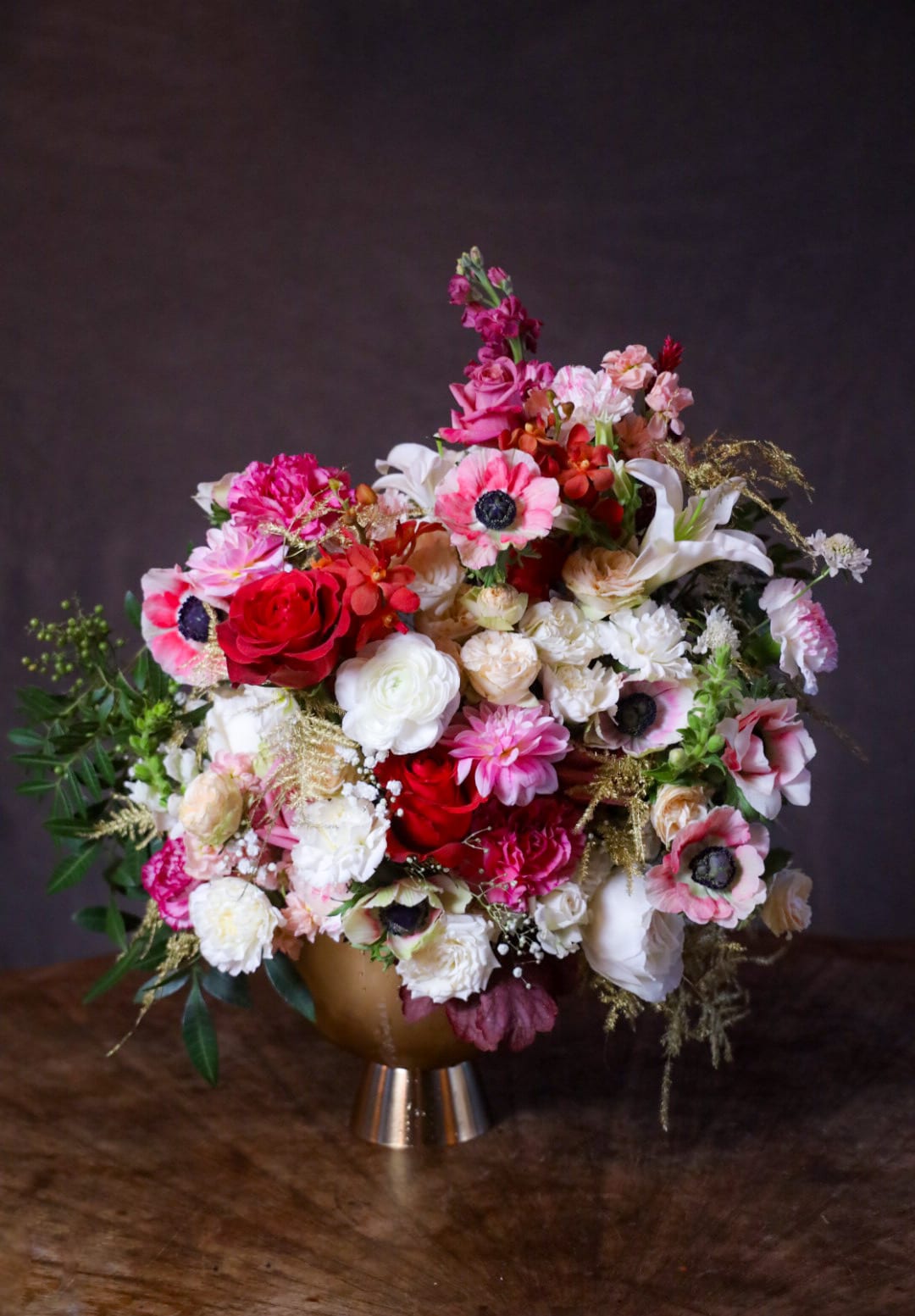 Icicles and Roses  Centerpiece - Icicles and Roses Limited Edition Winter Holiday Centerpiece  A centerpiece of sugared florals, soft and dreamy. Silvery &amp; shimmering with hints of gold. Softest blush, white, roses red and scarlet berries. Sparkling with wintry light.   Custom, one of a kind floral arrangements by floral artist Stacy Leafsong.  Photos provide examples, and each arrangement &amp; vase is unique.  Arrangements will be delivered before 7pm, for specific delivery time please include in special instructions. On holidays, our busiest times, deliveries will be made by 7:30pm.