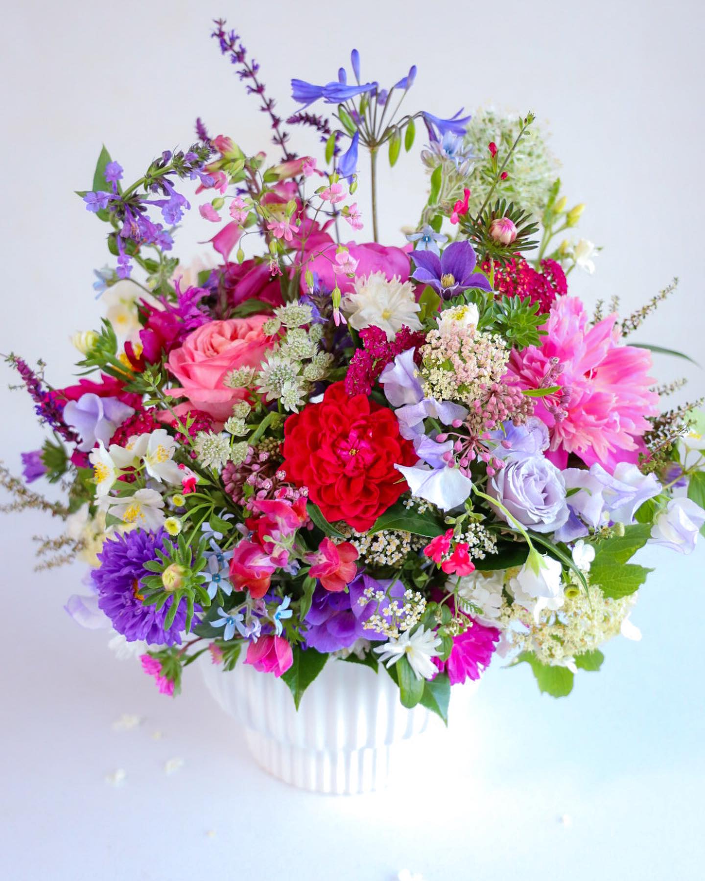 The Summer Celebration Centerpiece - The Summer Celebration Centerpiece! Having a party? Family gathering? Special Ocassion and everyday beauty. Allow us to adorn your table with custom floral art arrangements that illuminate joy, festivities &amp; delightful shared moment.  Custom, one of a kind floral arrangements by floral artist Stacy Leafsong.  Photos provide examples, and each arrangement &amp; vase is unique.  Arrangements will be delivered before 7pm, for specific delivery time please include in special instructions. On holidays, our busiest times, deliveries will be made by 7:30pm.