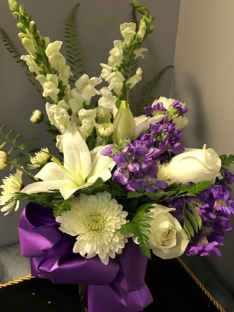 Tender Thoughts - White with a purple accent for color. White &amp; Purple Lily, Rose, Snap Dragon &amp; more..