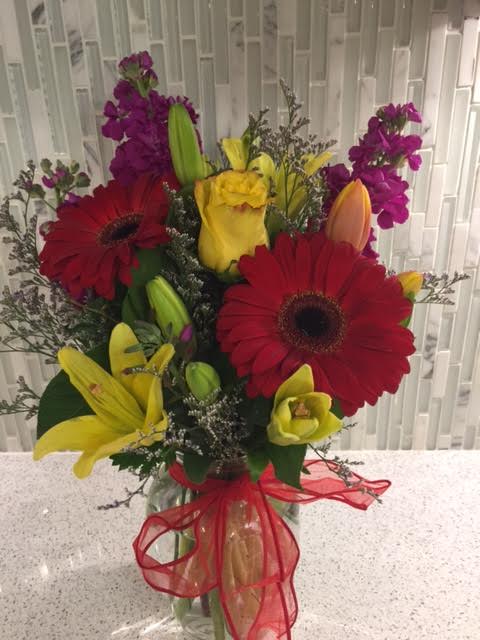 Bright thoughts Bright thoughts - bright and colorful with lilies, roses, stock and gerber daisy