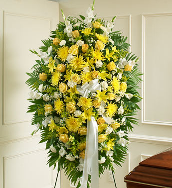 Deepest Sympathies Yellow Standing Spray - During times of loss, it can be hard to express exactly what you’re feeling in your heart. Let this beautiful standing spray arrangement of fresh yellow blooms, which signify friendship, and white blooms, which signify remembrance, help you convey your care and concern when words alone can’t.