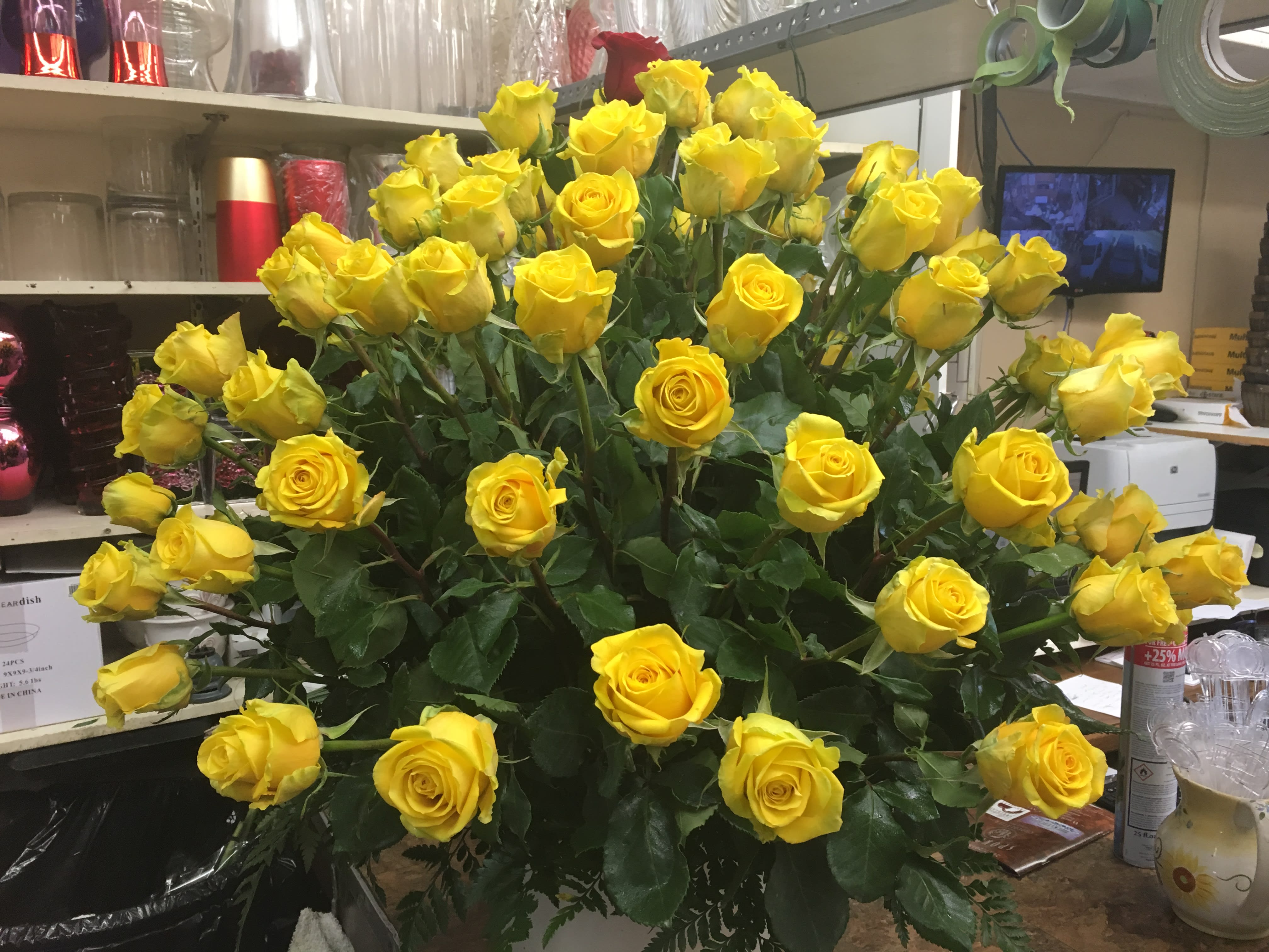 100 REASONS WHY - 100 COLORED ROSES TO MAKE ANY GIRL HAPPY! HOW CAN SHE SAY NO WHEN THIS COMES TO HER DOOR. YOU PICK THE COLOR ROSES, RED, WHITE, PINK, PEACH, YELLOW, LAVENDER.OR ALL THE COLORS MIXED.   WE DO NEED A FEW DAYS NOTICE TO MAKE SURE WE HAVE ALL THE CORRECT COLOR ROSES. 