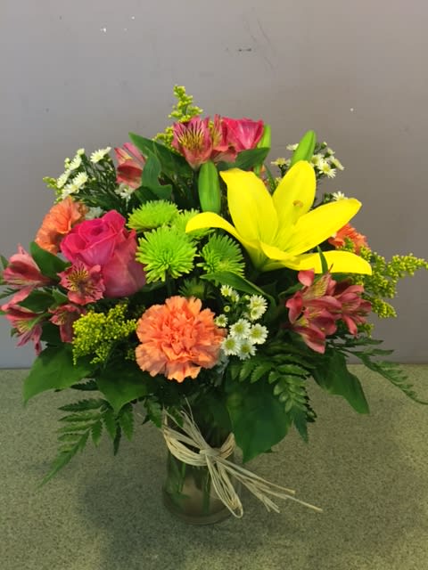 Fields of Color (FOC) - If you are looking for a bright colored vase- you found it!  Fields of color is a beautiful combination of hot pink, green orange and yellow! ** Please Note Lily Color may differ from pictured**
