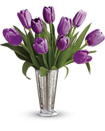 Tantalizing Tulips Bouquet by Teleflora - Pure lovely. Long-stemmed purple tulips are a tantalizing treat in our shimmering mercury glass vase. This bouquet is a timeless symbol of your singular love. Includes ten purple tulips. Delivered in Teleflora's large Mercury Glass Julep. Orientation: All-Around