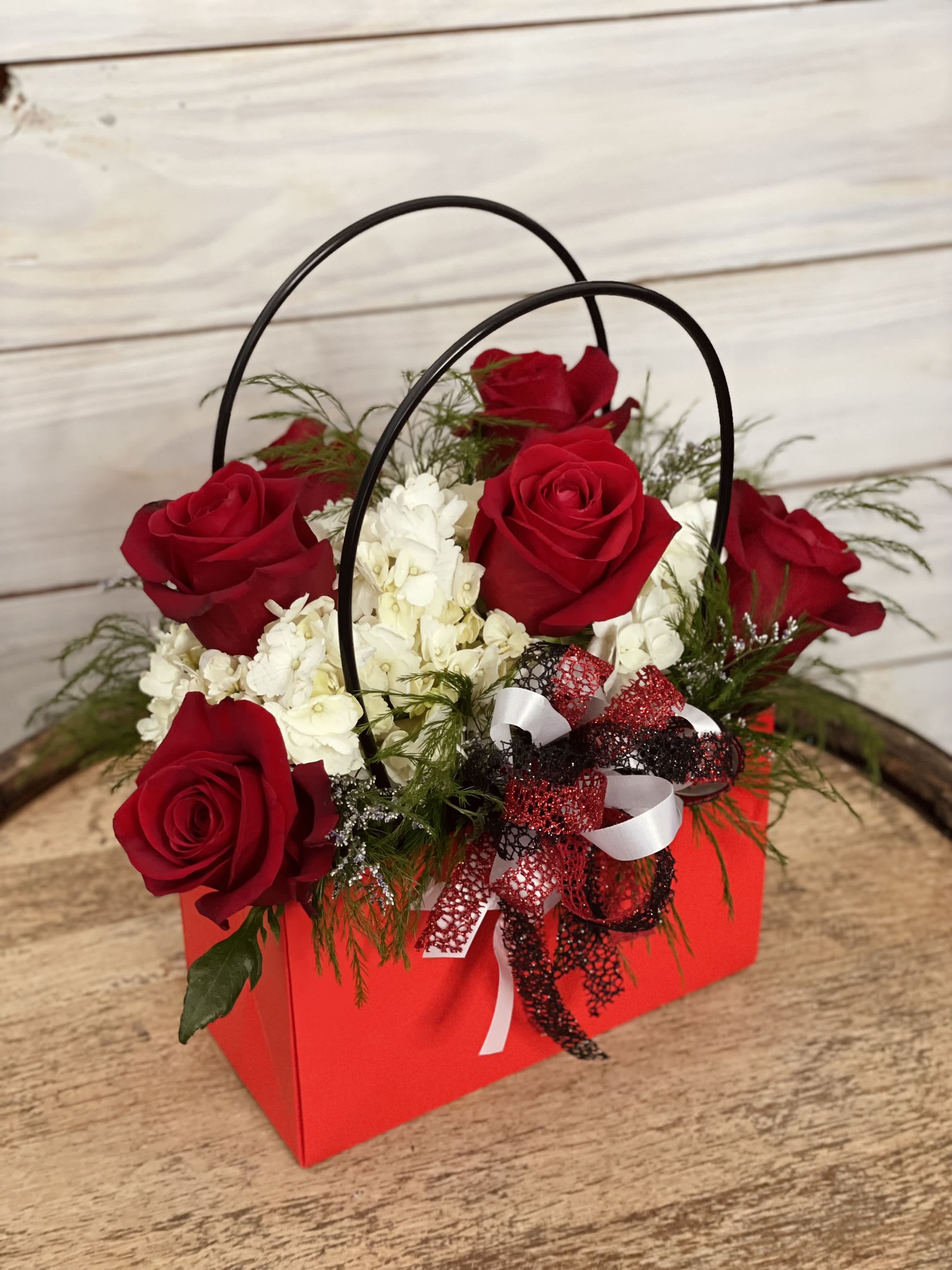 Queen - A royal red paper purse filler with white hydrangeas and red roses. Perfect for the Queen in your life!