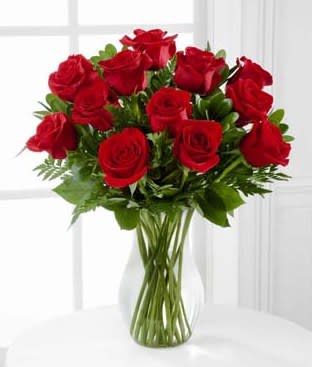 Blooming Masterpiece - 12 red roses in 8in vase. Height 17in x Width 14in