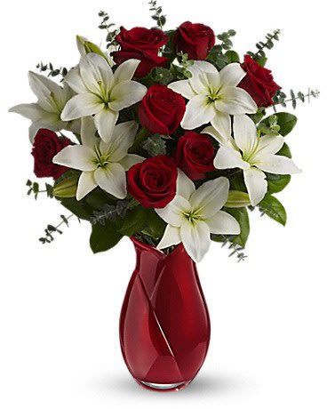 Look Of Love Bouquet - A beautiful arrangement of white Lilies and red Roses with mixed greenery. *Vases will vary*