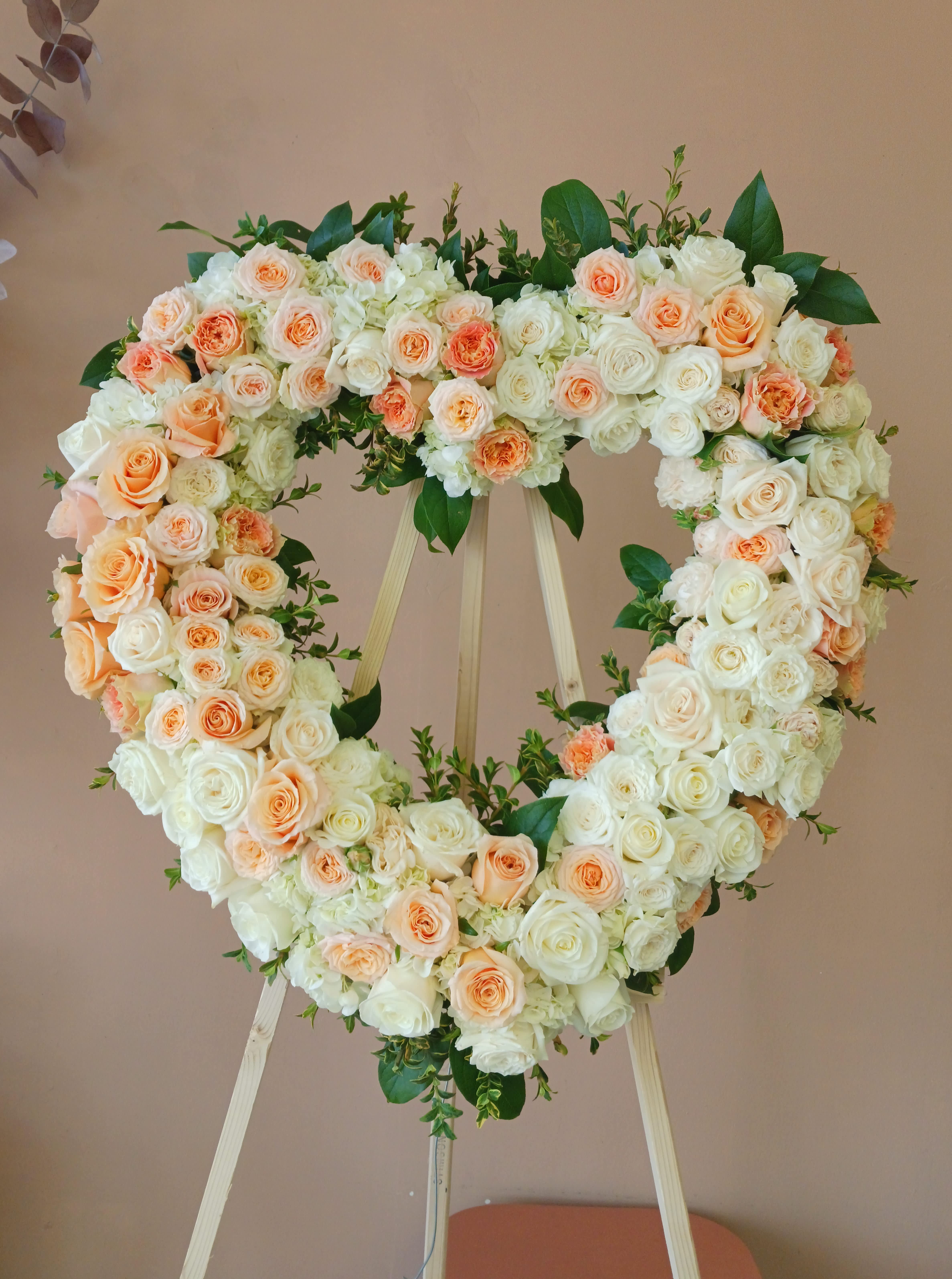 Peaches & Cream Heart Peaches & Cream Heart - This heart is 24inches and it includes all premium roses (garden roses) and hydrangeas.