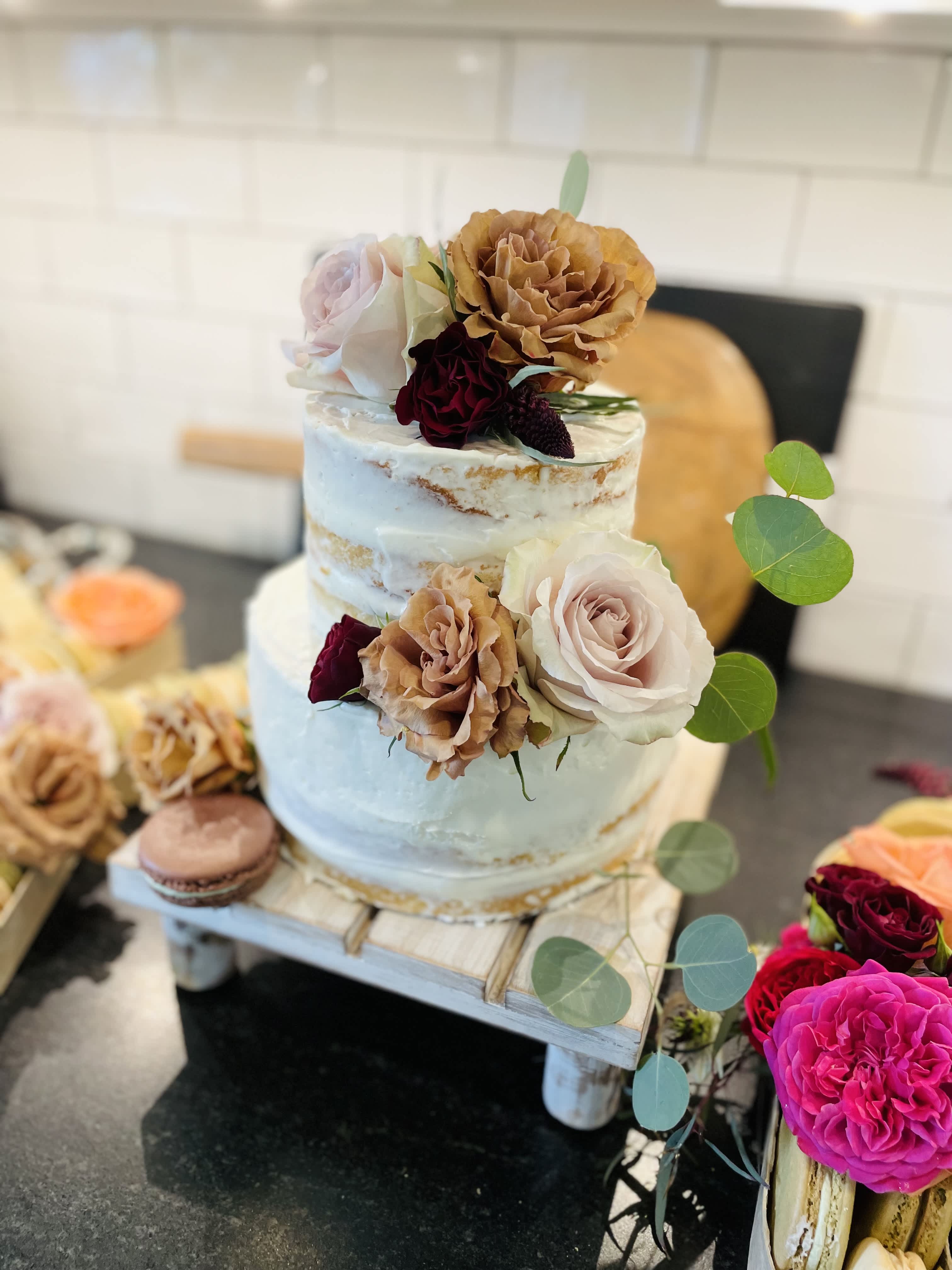 Cake Flowers - Blooms from your chosen color palette that can be used as a cake topper or embellishment on your wedding cake.