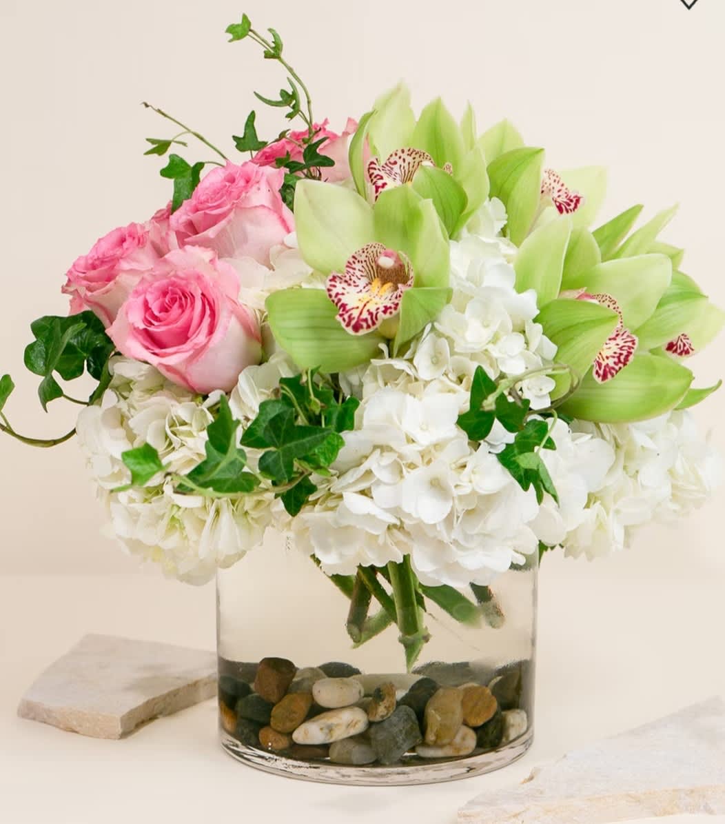 Delicate Touch - color pink roses, green  cymbidiums orchid white hydrangeas . color can be flowers can be substitute 