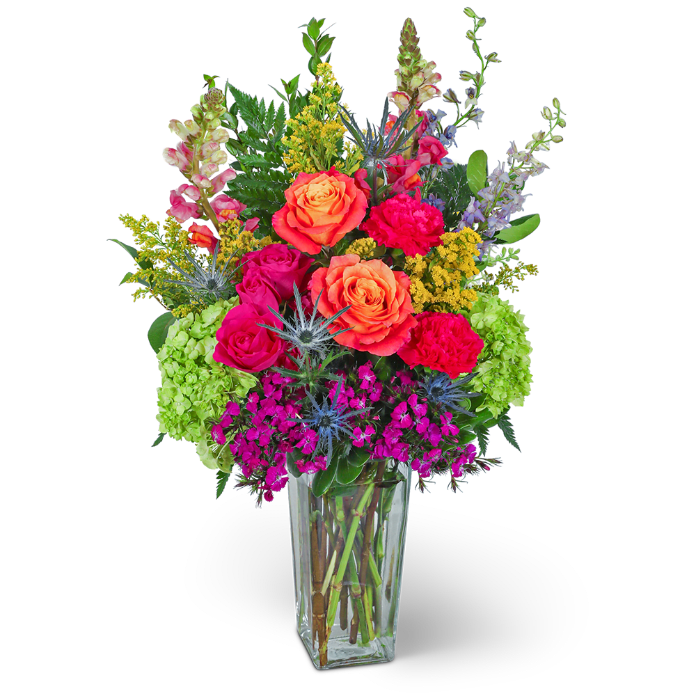 Garden Party - Step into a world of blooming beauty with our Garden Party flower design. This exquisite arrangement showcases a delightful medley of roses, hydrangeas, carnations, snapdragons, larkspur, and other premium blooms and foliage. Order now and bring the beauty and spirit of a garden party into your home or make it a memorable gift for someone special.