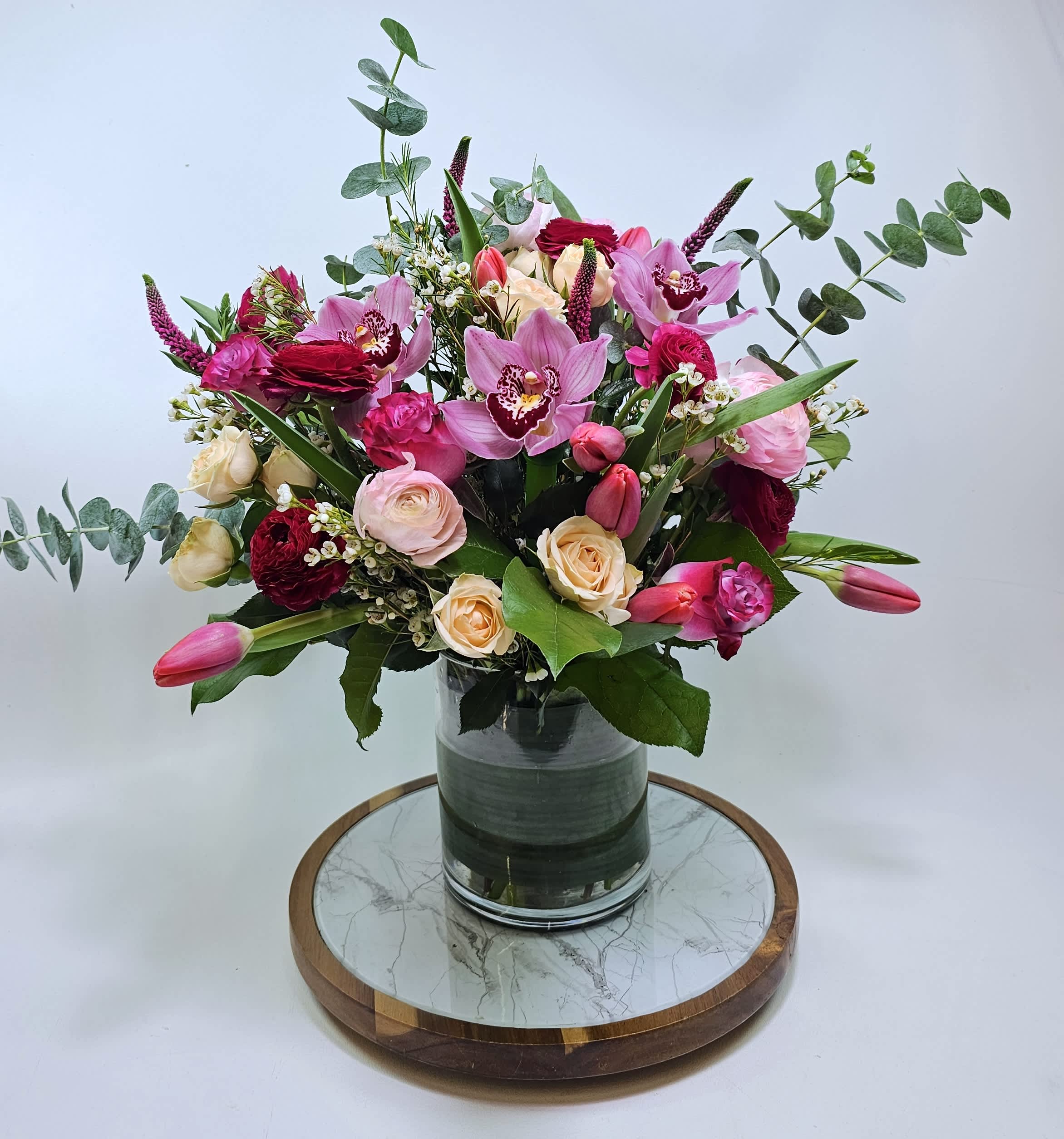 Be My Valentine - Nothing says &quot;Be Mine&quot; like a stunning bouquet! Filled with ranunculus, tulips, roses, veronica, and fillers. This arrangement makes the perfect gift to show your love, or the perfect home centerpiece! 