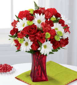 Cherry Sweet Bouquet Cherry Sweet Bouquet - A bright arrangement of red Roses, mini Carnations, Alstroemeria, Carnations, green button Daisies, white Daisies and Greens come together in a bright red vase to create a perfect arrangement of all occasions including Valentine's Day and just because. *****WE CURRENTLY DON'T HAVE THIS VASE, WE WILL SUB AS SIMILAR AS POSSIBLE****