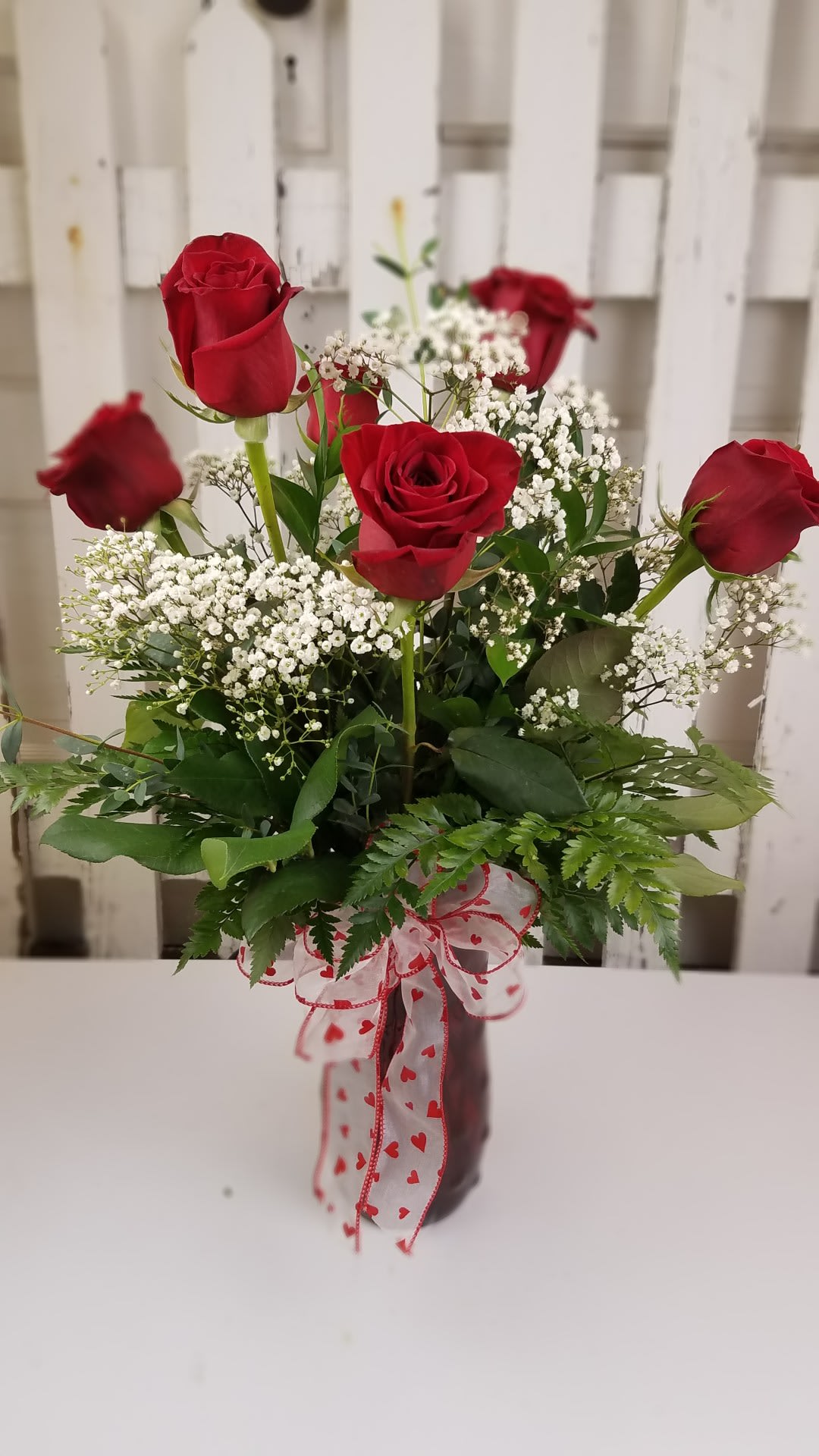 Half Dozen Roses - 6 red roses in a vase with Valentine's ribbon.
