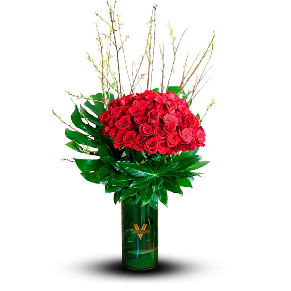 Spiked Ruby - The blend of radiant red blooms and spiky leaves creates an intriguing interplay of elegance and boldness. This striking color and texture combination is perfect for events seeking to make an audacious yet refined statement.  In the event of an unavailable bloom, we will seamlessly substitute with alternatives of equal or greater value to ensure your satisfaction with the exceptional standard of your arrangement.