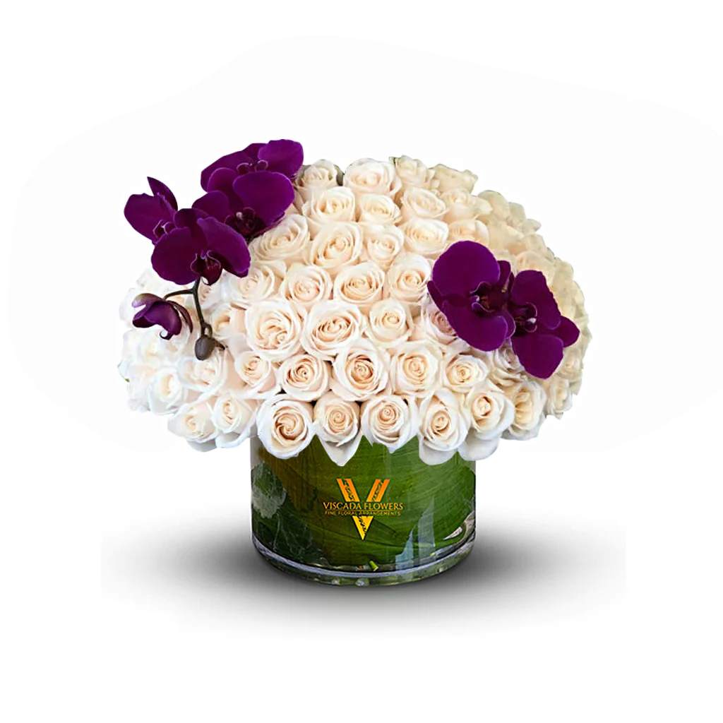 Purple Kissed - A touch of royal elegance meets pure sophistication in this bouquet. Gorgeous shades of lavender set against a backdrop of pristine white create a captivating visual treat.