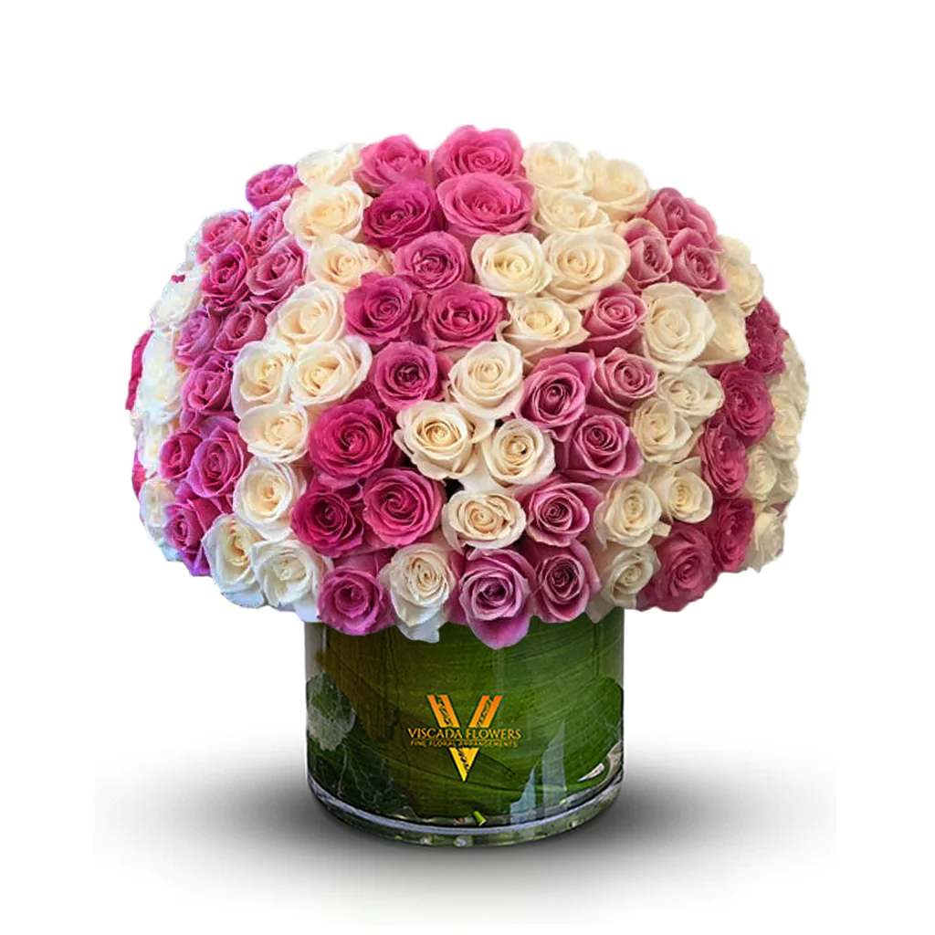 Youthful Love - This exquisite arrangement blends soft pinks and creamy hues to create an ambiance of romance and elegance. The interplay of color evokes a sense of passion that is both tender and captivating. Perfect for special occasions or as a refined gift, this bouquet exudes sophistication and heartfelt emotion.