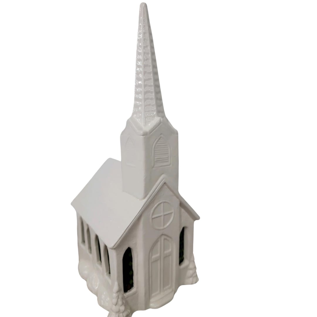 Small Glass Church  - This Elegant small church is a perfect gift for a loved one.  It comes with a power cord and light that shows off its beautiful stained glass windows.  It measures 9.5&quot; Tall and 4&quot; Deep.  It also plays amazing grace.  Upgrade this beautiful church with fresh flowers.  The Premium Option will include a Designer's Choice arrangement that will surround the church with vibrant color. 