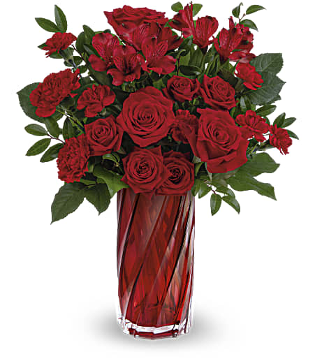 Meant For You Bouquet - Nothing gets them feeling better than receiving a beautiful bouquet, just for them! Filled to the brim with radiantly red roses, this bouquet is presented in a shimmering art glass vase with a captivating swirling design. Approximately 14 inches wide and 16 1/2 inches tall for the Standard size.