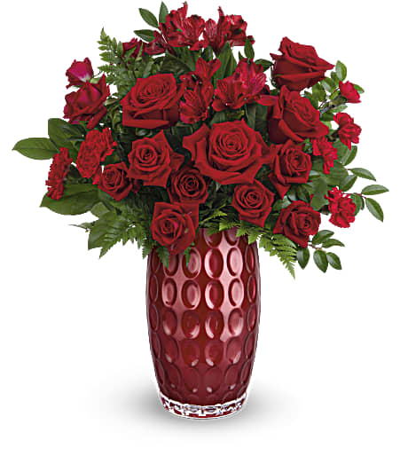 Geometric Beauty Bouquet - Get them feeling better with this radiant all-red floral design that has a bold glass vase featuring a modern geometric pattern and pretty pearlescent finish. Approximately 17 inches wide and 19 inches tall for the Standard size.