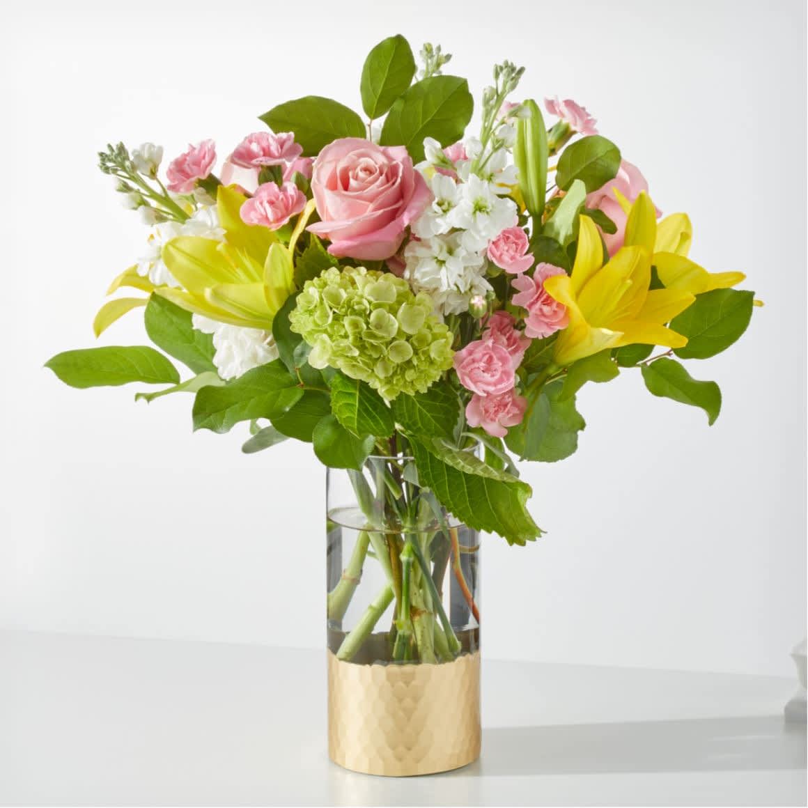 Garden Delight Bouquet - This soft color bouquet will bring some warmth to your home. It will remind you that Spring/Summer is upon us.