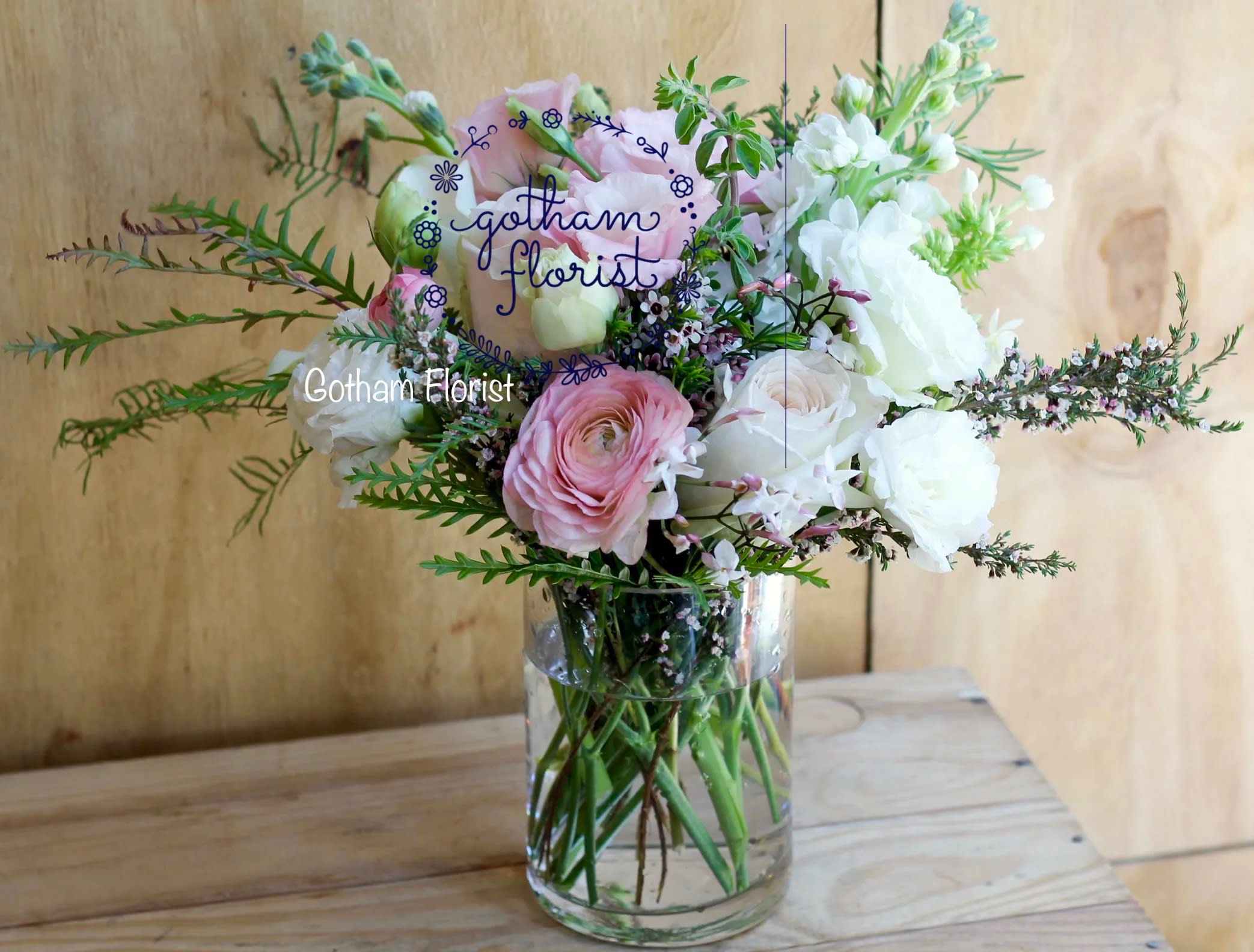 La Boheme - Pink and white roses, lisianthus and seasonal foliage. Perfect mix of pretty flowers in a glass vase, perfect for a desk!  Send this popular design from the best #nyc florist. Send the best flowers from the best flower shop in New York. We offer same day flower delivery in Manhattan, Queens, Bronx, Brooklyn, Staten Island and West Chester counties. We have the prettiest and most luxurious flowers to choose from and our designs are unique and whimsical. We carry Peonies almost every day of the year!! #bestflorist #manhattan #newyork #bestflorist #samedaydelivery #nycflorist #ranunculus #blushflowers #flowerdelivery